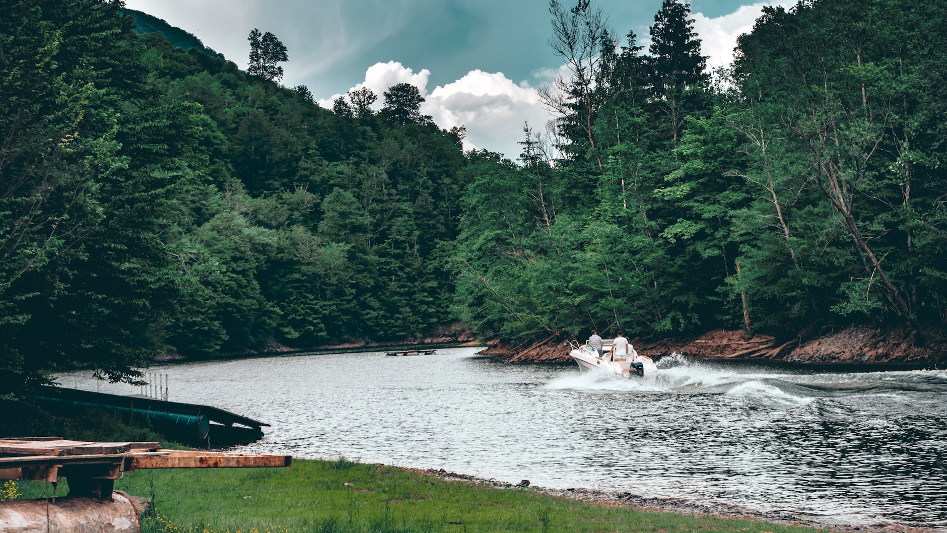 photo of people riding speedboat